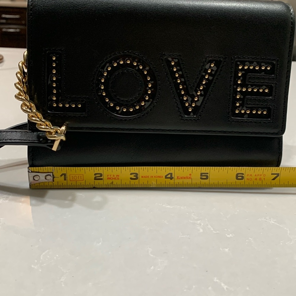 Michael Kors “LOVE” crossbody bag